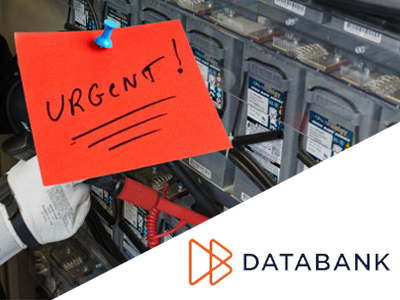 Battery cabinet with urgent post-it note and Databank logo.